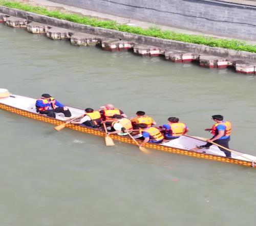 跨界互动！海港主帅穆斯卡特体验普陀龙舟赛