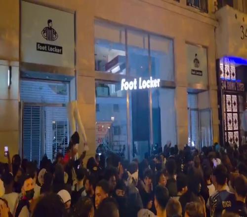 真假球迷巴黎球迷在当地焚烧汽车并抢劫商店,庆祝球队赢得欧冠