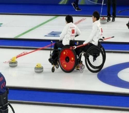 米兰冬残奥会中国轮椅冰壶队首战告捷｜快讯