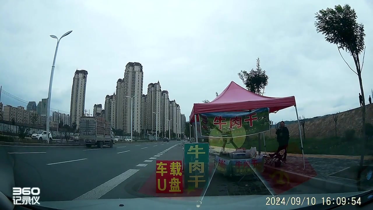 牛肉干的摊主有一点失落