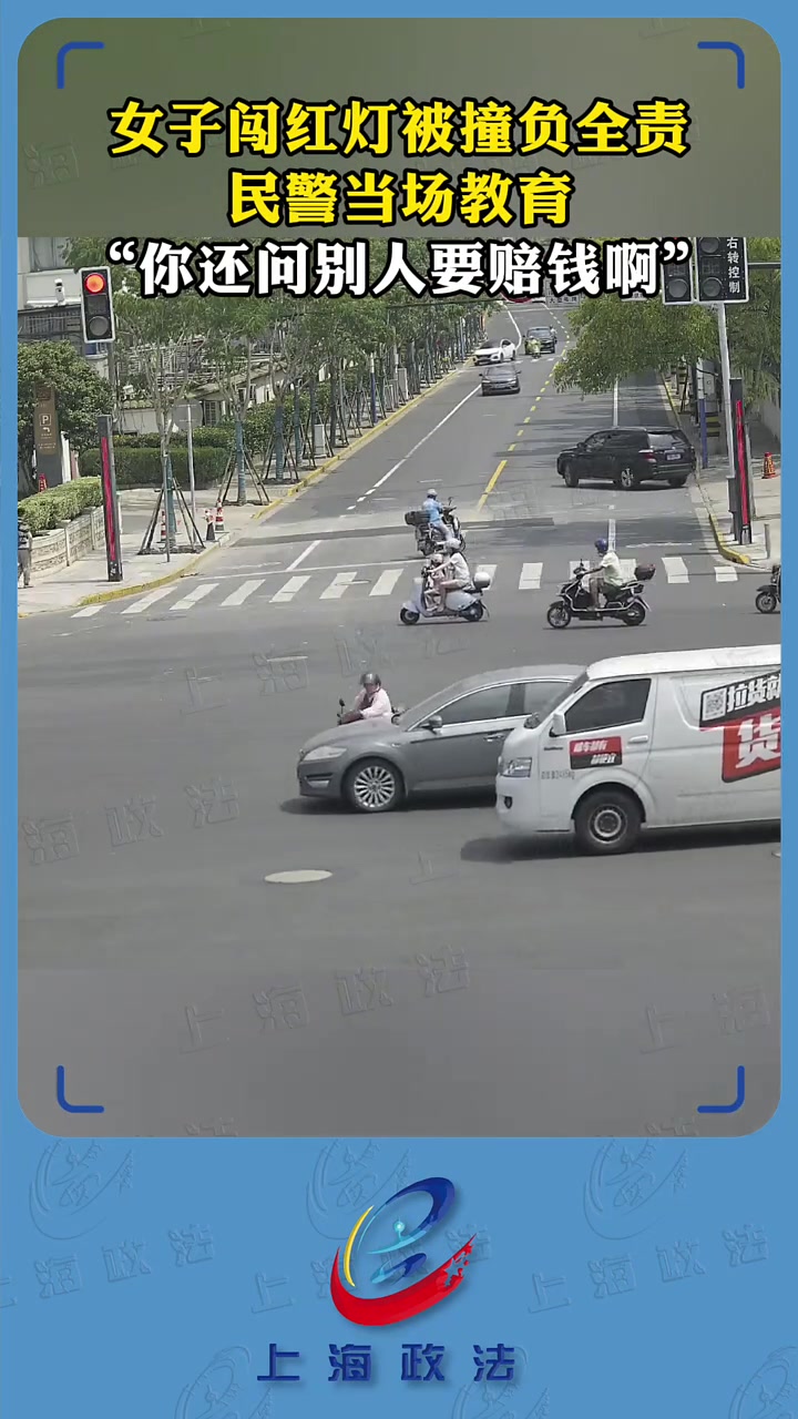 女子驾驶电动自行车在机动车道行驶的同时，竟还无视红绿灯