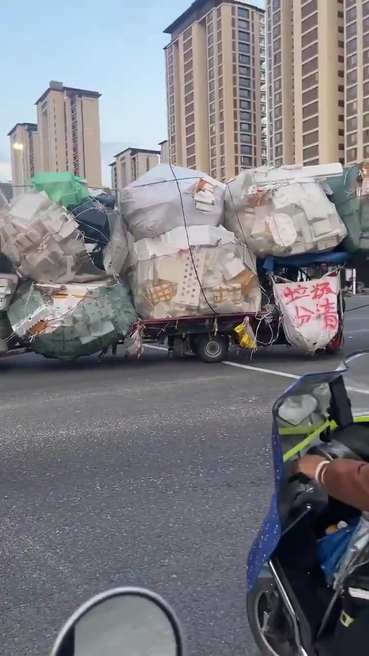 三轮车当半挂使啊？